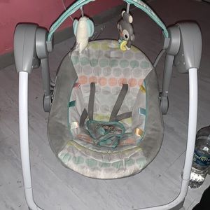 A baby swing ! Including 2 toys , head pillow, n also battery’s!!! Used twice